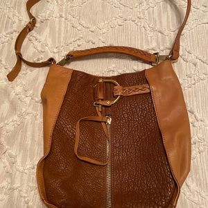 Brown leather convertible purse